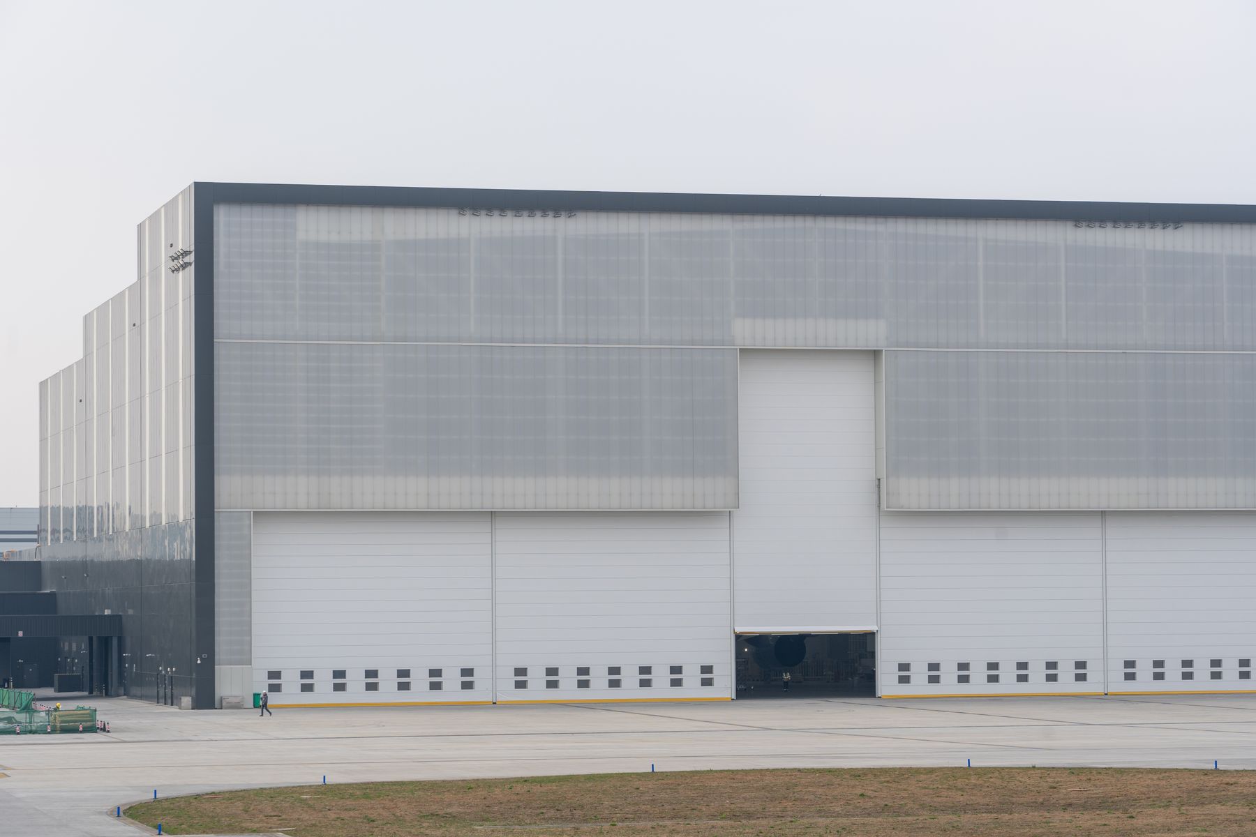 Large modern industrial warehouse with loading doors
